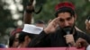FILE: Manzoor Pshteen, the leader of the Pashtun Tahafuz Movement (PTM), speaks during a demonstration in Lahore in April 2018.