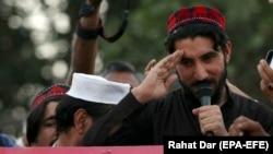 FILE: Manzoor Pshteen, the leader of the Pashtun Tahafuz Movement (PTM), speaks during a demonstration in Lahore in April 2018.