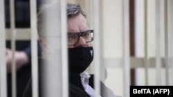 Opposition politician and banker Viktar Babaryka appears in court in Minsk in February.