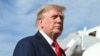 US President Donald Trump speaks to reporters before boarding Air Force One at Joint Base Andrews, Maryland, on August 21.