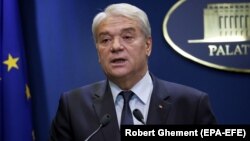 Romanian Interior Minister Nicolae Moga announces his resignation in Bucharest on July 30.