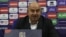 Kazakh national soccer team coach Stanislav Cherchesov speaks at a press conference after the Kazakhstan-Slovenia game on October 13.