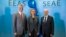 Kosovar Prime Minister Isa Mustafa (right), Kosovar President Hashim Thaci (l) and European Union foreign policy chief Federica Mogherini attend talks on establishing normal relations between Serbia and Kosovo in Brussels on January 24. 