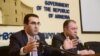 Armenia - Deputy Minister of Economy Garegin Melkonian (L) speaks at a press conference in Yerevan, 18Feb2014.