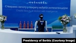 A robot bartender during the opening of the Sabac factory
