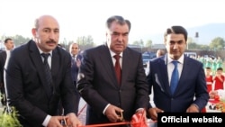 Tajik President Emomali Rahmon (center) with his son Rustami Emomali (left) in December