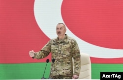 Azerbaijani President Ilham Aliyev speaks at the opening of the Military Trophies Park on April 12.