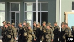 Georgian soldiers returning to their base in Gori this week.