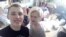 Igor Shamin (left) and Tatyana Push, a volunteer who works with orphans and at-risk children.