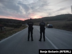 Serbian police near the blockade at the Merdare border crossing on September 6