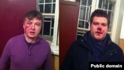 Избитые в Киеве депутат от партии "Свобода" Андрей Ильенко и адвокат Сидор Кизин