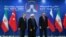 Iran's President Hassan Rouhani (C), flanked by Russia's President Vladimir Putin (L), and Turkey's President Recep Tayyip Erdogan, after posing for photographs in Tehran, Iran, ahead of their summit to discuss Syria, Friday, Sept. 7, 2018.
