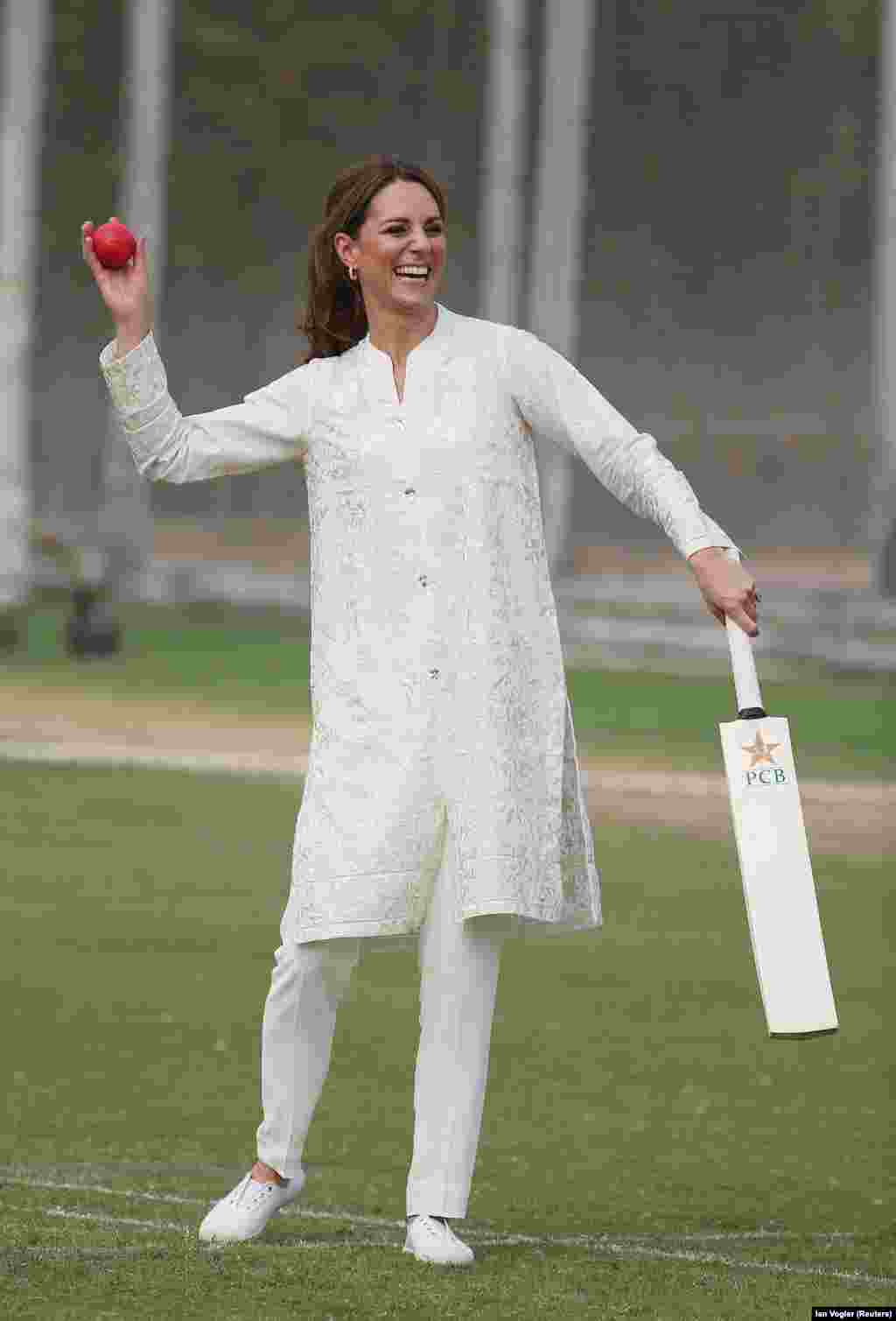 Catherine, the duchess of Cambridge, plays cricket at the National Cricket Academy in Lahore on October 17.