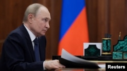 Владимир Путин