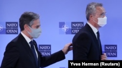 Secretarul de stat al Statelor Unite, Antony Blinken, și secretarul general al NATO, Jens Stoltenberg, 23 martie, 2021