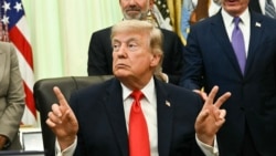 US President Donald Trump speaks before signing a proclamation in the Oval Office of the White House in Washington, DC, on June 11, 2026. 