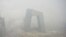The CCTV tower in Beijing shrouded in smog.