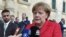 Cancelarul Angela Merkel răspunzînd întrebărilor presei astăzi la sosirea în Malta