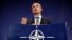 NATO Secretary-General Jens Stoltenberg gestures during a press conference at the military alliance's headquarters in Brussels on December 1. 