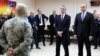 GEORGIA -- NATO Secretary-General Jens Stoltenberg and Georgian Prime Minister Mamuka Bakhtadze, right, meet with Georgian soldiers during multinational military exercises NATO - Georgia Exercise 2019 at the NATO-Georgia Joint Training and Evaluation Cent