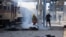 Emergency employees work at a railway station hit by a Russian drone strike in Dnipro, Ukraine, on October 29.