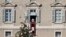 Pope Francis delivers a speech during from his studio window overlooking St. Peter's Square on December 24.
