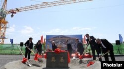 Armenia - Senior Armenian and Chinese officials break ground on the site of a new Chinese embassy bulilding in Yerevan, 9Aug2017.