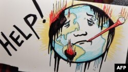 Плакат під час однієї з акцій на підтримку боротьби з кліматичними змінами