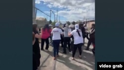 Armenia - A group of opposition supporters are confronted by government loyalists in the village of Nor Kyurin, June 2, 2026.