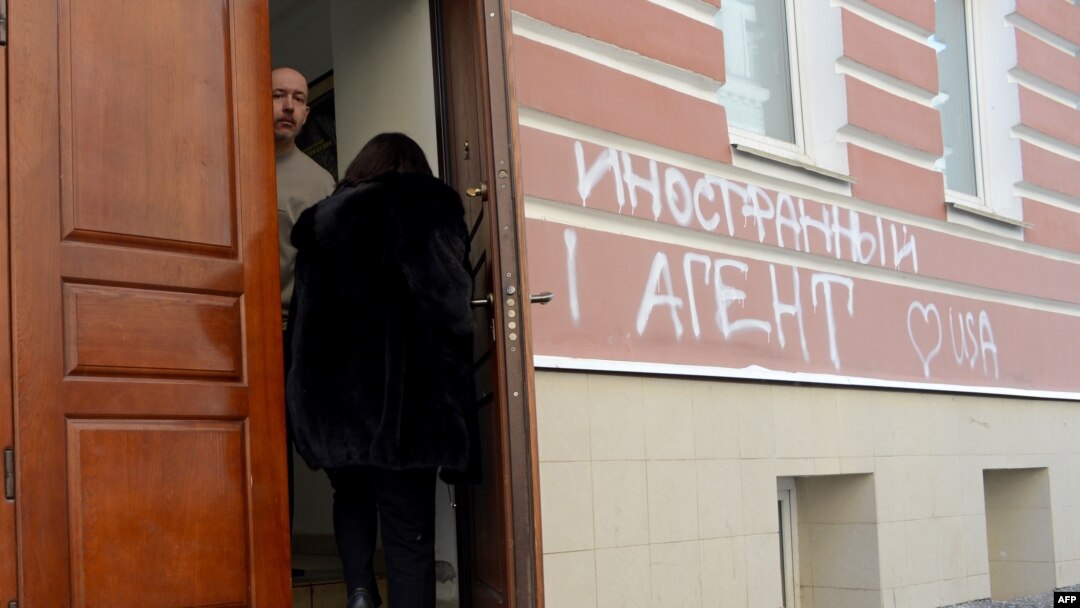 The offices of Russia's Memorial rights group in Moscow was vandalized with graffiti reading "foreign agent [heart] USA" in March 2013.