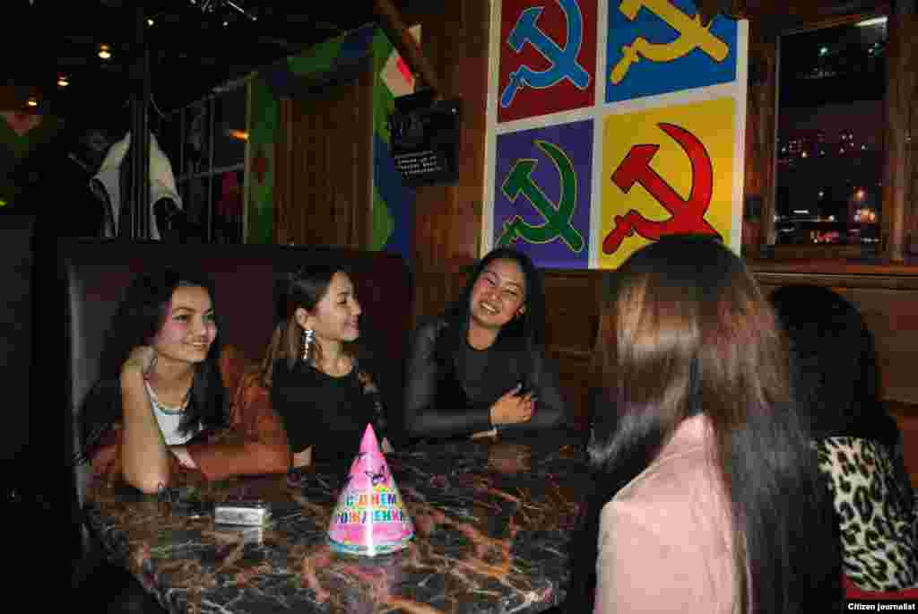 A birthday celebration in a Soviet-themed restaurant.