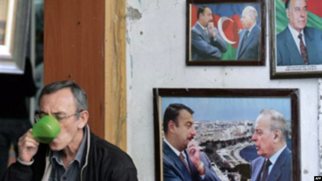Portraits of the late President Heydar Aliyev and his son, current President Ilham Aliyev, are a common sight in Azerbaijan.