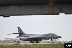 A US Air Force B-1 Lancer bomber is pictured on the tarmac at the RAF Fairford base in Fairford in southwest England late last month.
