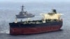 The Arleigh Burke-class guided-missile destroyer USS Rafael Peralta takes part in a maritime blockade against an Iran-flagged crude oil tanker vessel.