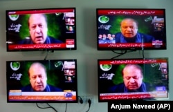 Pakistani news channels telecast live of Pakistan's former Prime Minister Nawaz Sharif addressing to opposition parties meeting in Islamabad on September 21.