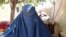 Afghan Election: She Can Vote, But Her Husband Decides video grab 1