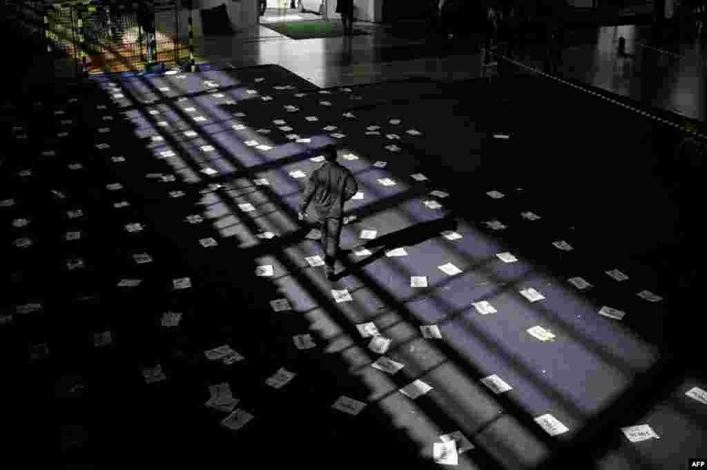 A Kosovar Albanian man leaves a polling station in Pristina.