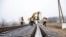 Muncitori de la Căile Ferate repară infrastructura feroviară pe tronsonul Tighina-Basarabeasca-Giurgiulești, ianuarie 2023.
