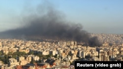 Smoke rises over Beirut on October 3 following an Israeli strike on the Lebanese capital. 