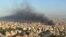 Smoke rises over Beirut on October 3 following an Israeli strike on the Lebanese capital. 