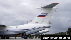 Russian paratroopers board an Ilyushin Il-76 transport plane as they take part in joint military exercises in Russia's Kaliningrad region in September.