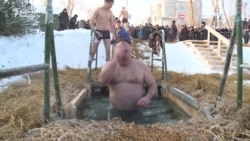 Orthodox Christians Celebrate Epiphany With Icy Plunges