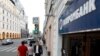 Russia -- People walk past an office of Gazprombank in central Moscow, July 17, 2014