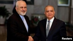 Իրաքի և Իրանի ԱԳ նախարարների ձեռքսեղմումը համատեղ ասուլիսից հետո, Բաղդադ, 10-ը մարտի, 2019թ.