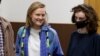 Natalya Tyshkevich (left) and Alla Gutnikova wait for a court session in Moscow on April 14.