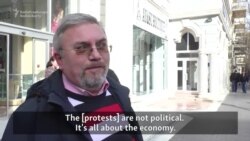 'People Are Asking For Jobs And Bread:' Azerbaijanis React To Protests Following Currency Collapse