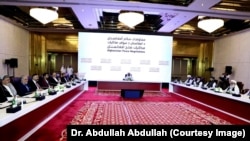 Во время переговоров в Дохе, 17 июля 2021 года