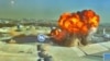 A screen grab from Kuwaiti Civil Aviation footage shows an Iranian kamikaze drone striking the country's international airport on June 3. 
