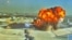 A screen grab from Kuwaiti Civil Aviation footage shows an Iranian kamikaze drone striking the country's international airport on June 3. 