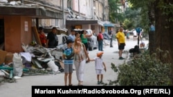 A major Russian drone and missile attack set Kyiv ablaze overnight on July 2, leaving areas across the Ukrainian capital strewn with shattered glass, charred trees, and burnt-out cars.<br><br>Local resident Olha <a href="https://t.me/svoboda_radio/46710" target="_self" class="wsw__a"><strong>visited</strong></a><strong> </strong>the aftermath in the city's Darnytskiy district with her children. She used to live in a high-rise residential building there that was now partially reduced to rubble following the strikes.